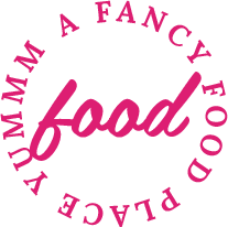 a circular text sticker that says yummm a fancy food place